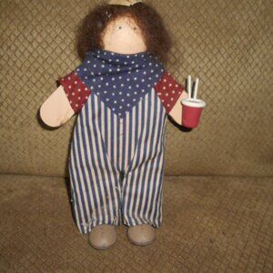Wooden Doll with Drink & Newspaper Hat